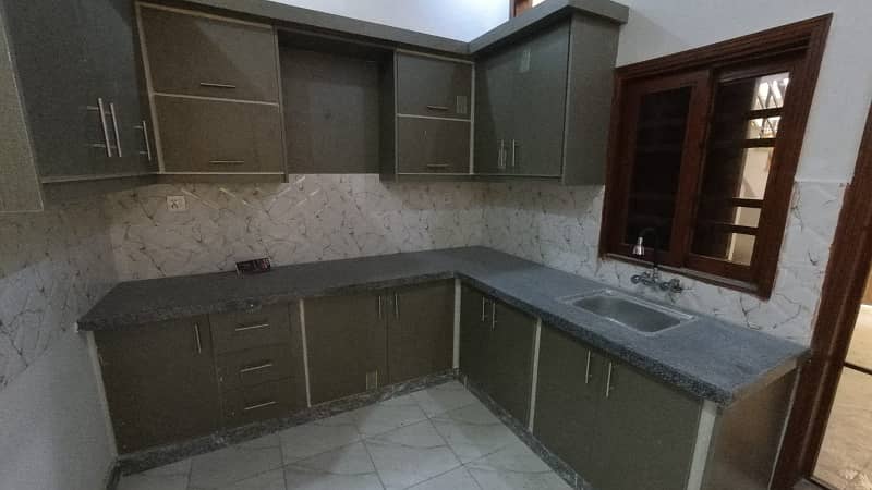 Independent Double Storey Brand new 120 yds stunning bungalow available for rent. Ground floor: 2 bedrooms, drawing room, lounge, American kitchen, tiled flooring. 14