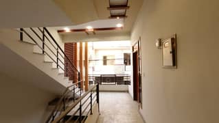 Independent Brand new 120 yds double storey bungalow available for rent. Ground floor: 2 bedrooms, drawing room, lounge, American kitchen, tiled flooring. 1st floor: 2 bedrooms, drawing room, lounge, American kitchen, tiled flooring, open ceiling.