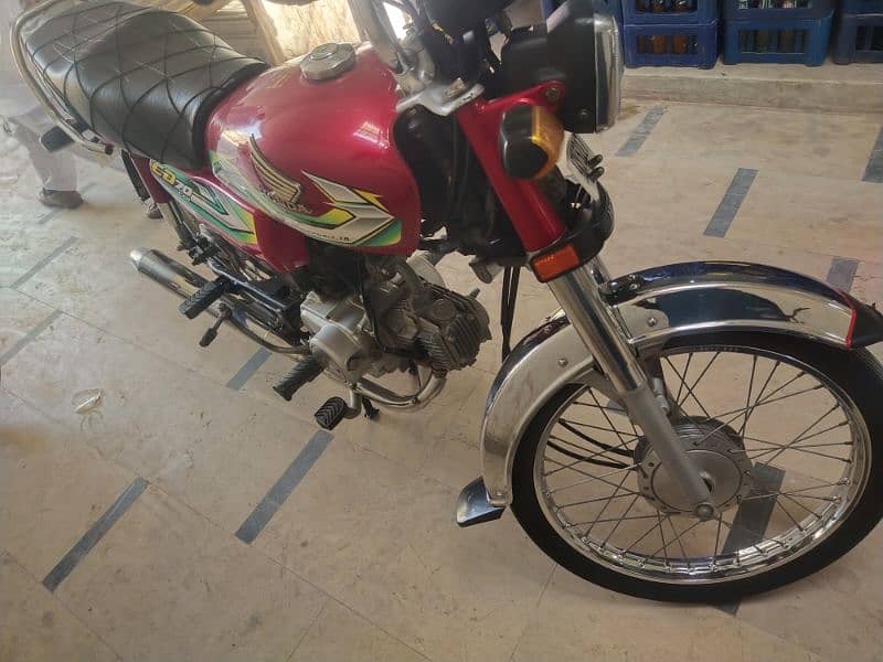 Honda 70cc 2023 4