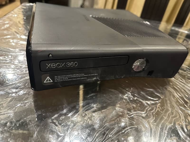 Xbox 360 Slim 0