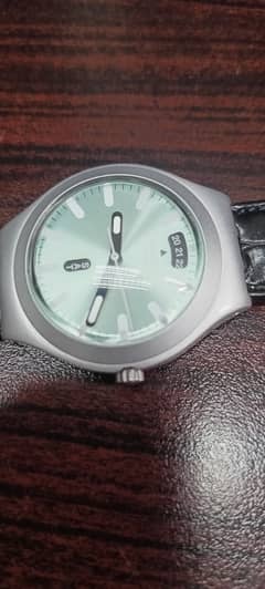 Swatch 38 mm light green Dail new condition