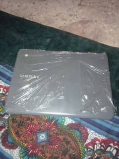 Samsung Chromebook with Charger.