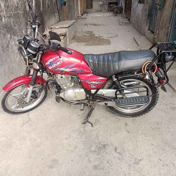 SUZUKI 150 GOOD CANDITION ONE HAND USE GOLDON NUMBER HY 0