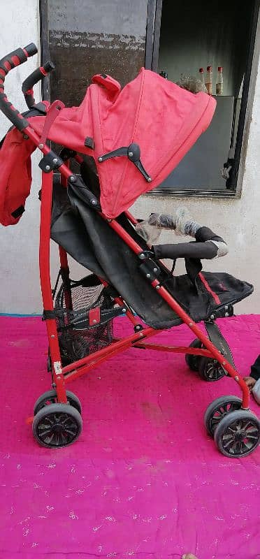 kids pram in good condition 1