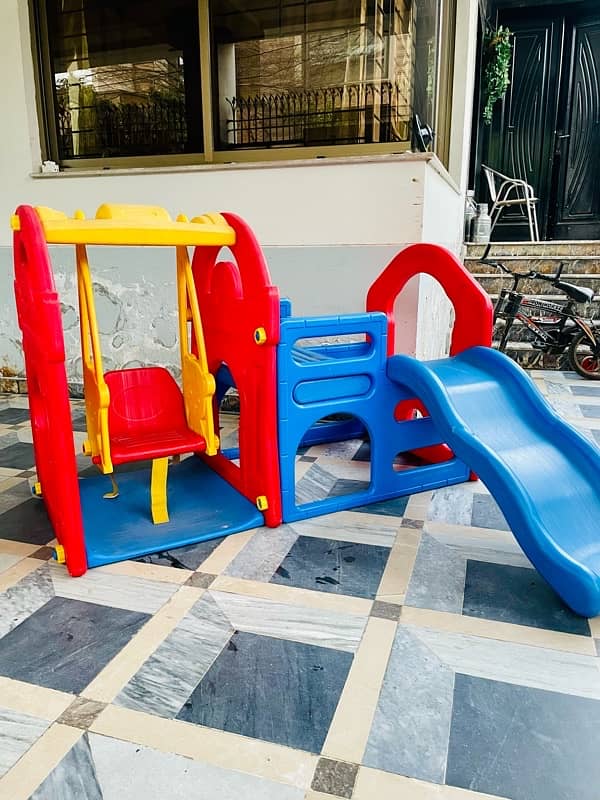 kids playing swings and slide 1