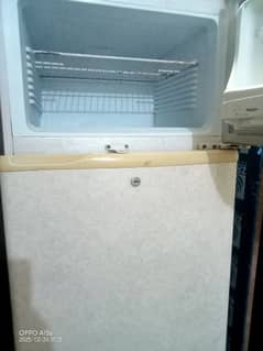 half white colour refrigerator used full