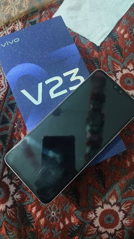 vivo v23 mobile 10/10 cindition hai demand 65000 hai final 60k 2