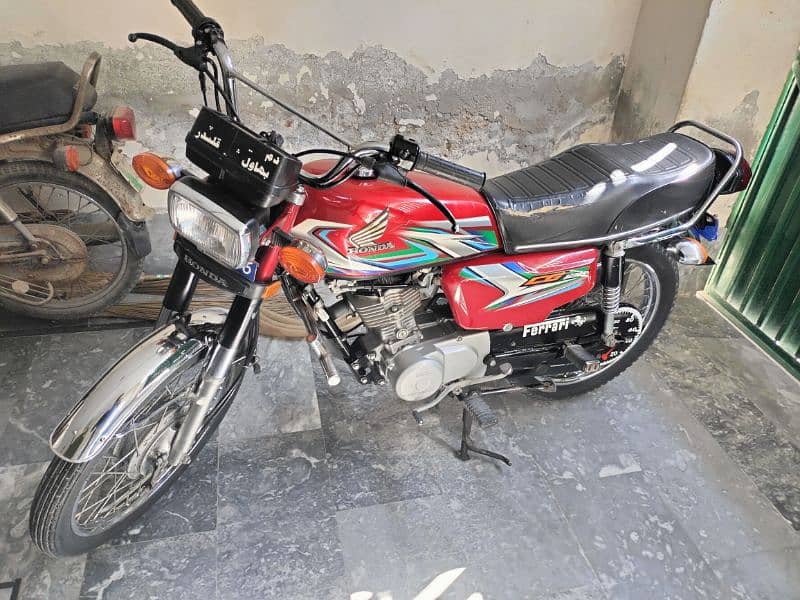 Red Honda 125 2