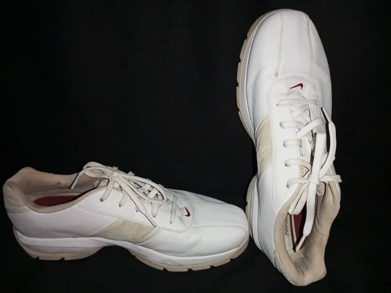 Nike sport performance spiked white shoes 0