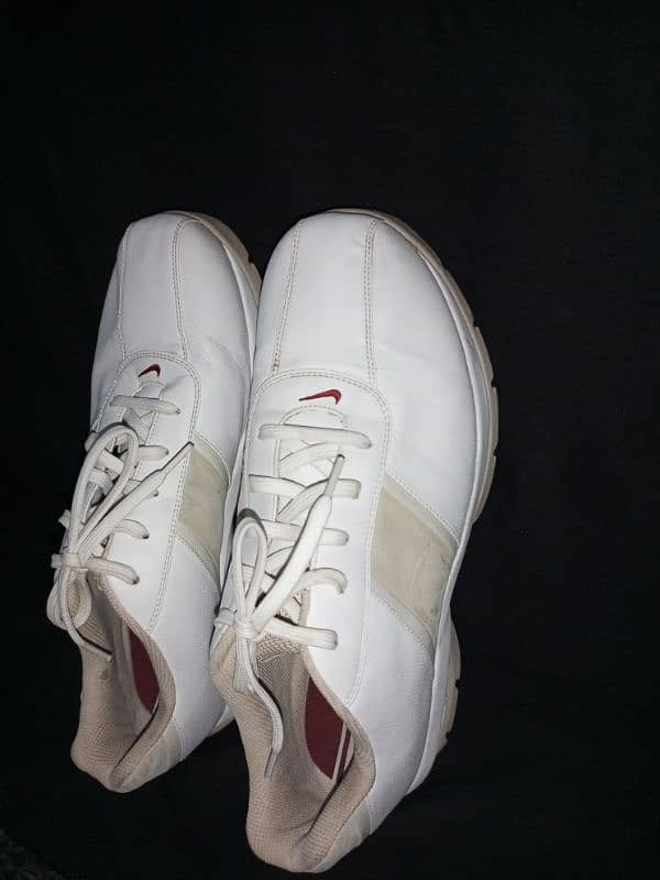 Nike sport performance spiked white shoes 2