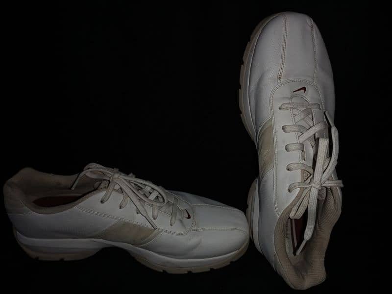 Nike sport performance spiked white shoes 4