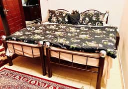 2 single iron rod bed customised with diamond supreme mattress