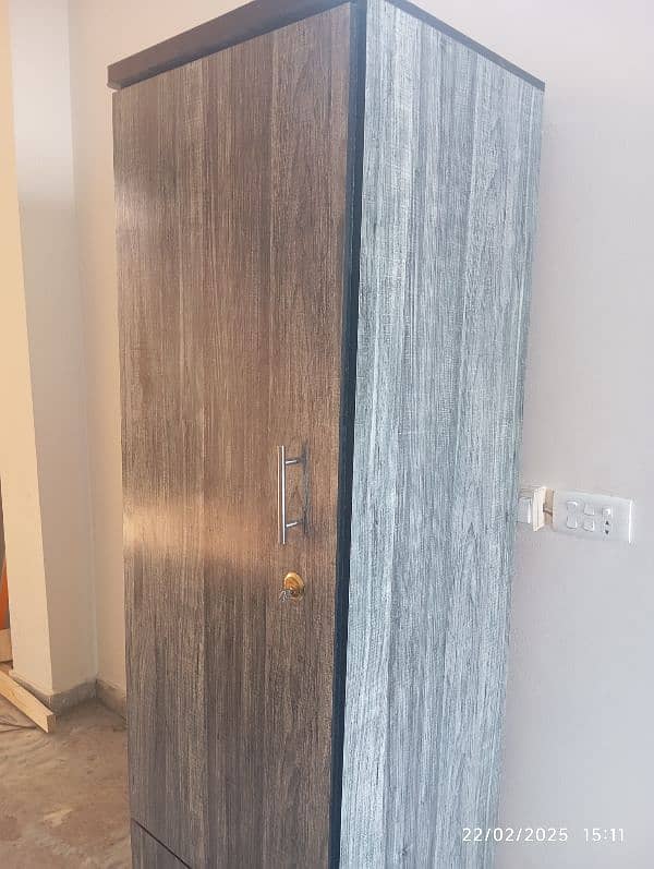 Best quality wooden wardrobe with channel drawer and smooth tyres. 3