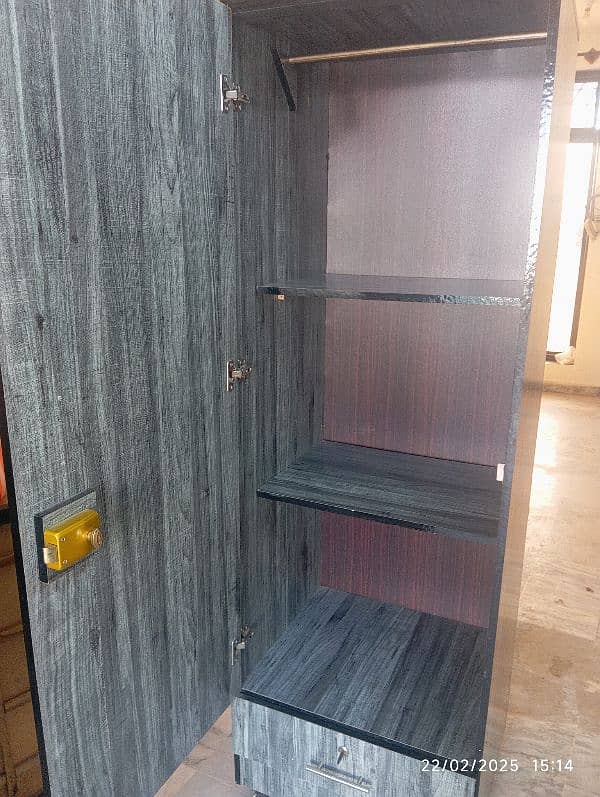 Best quality wooden wardrobe with channel drawer and smooth tyres. 4