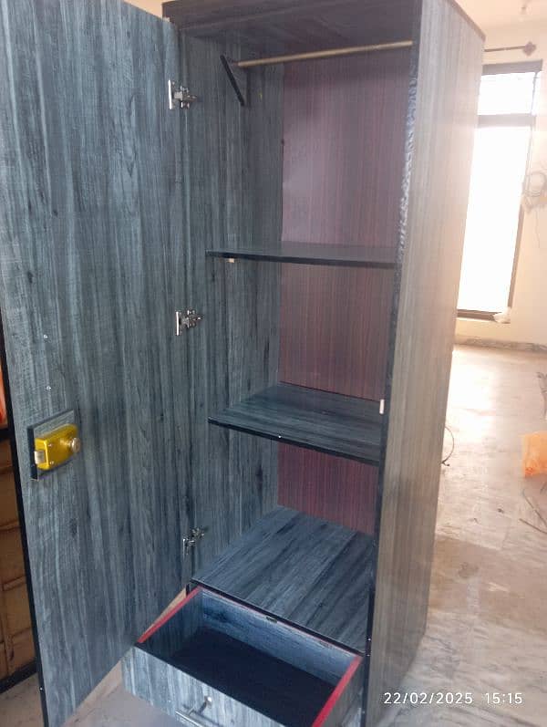 Best quality wooden wardrobe with channel drawer and smooth tyres. 11