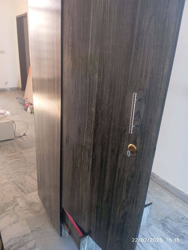 Best quality wooden wardrobe with channel drawer and smooth tyres. 12