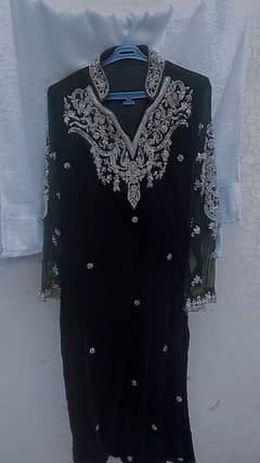 black color shanel in cloth with golden work