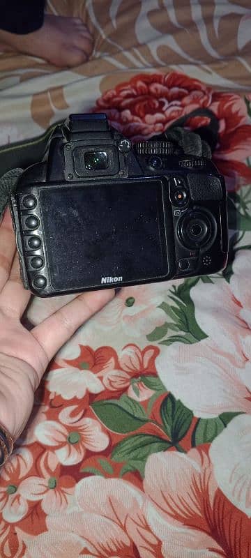 Nikon digital camera and charger  18.55 mm 1:3.5-5.6 camera 4