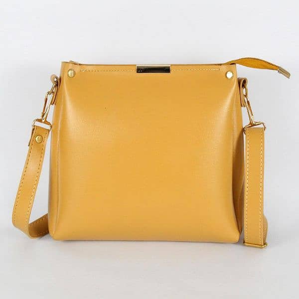 girls Rexine yellow bag 1