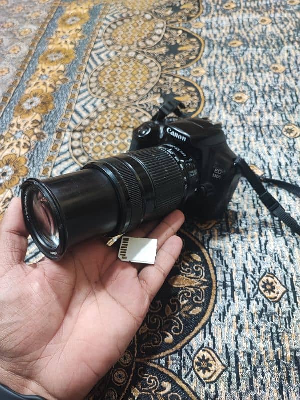 Canon Eos 1300 with 55/250mm lens. 1