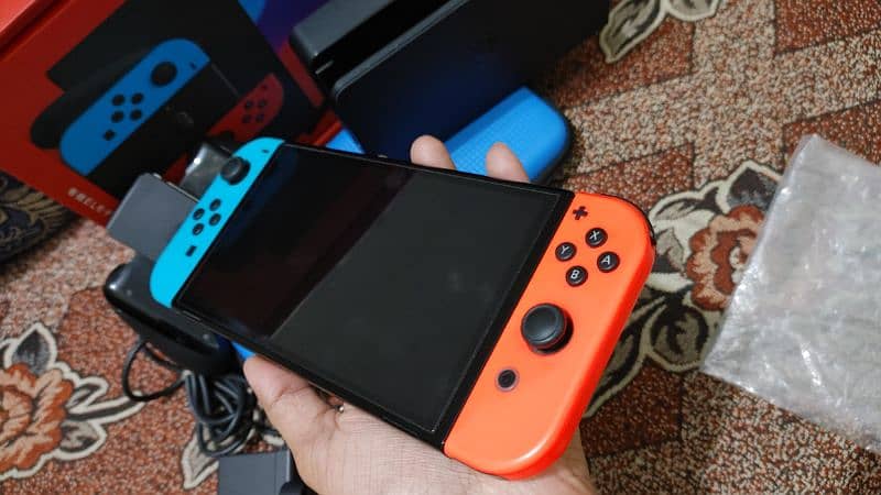 Nintendo switch oled jailbreak 128gb with boxe complte 2