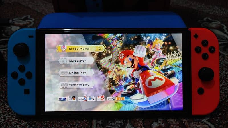 Nintendo switch oled jailbreak 128gb with boxe complte 8