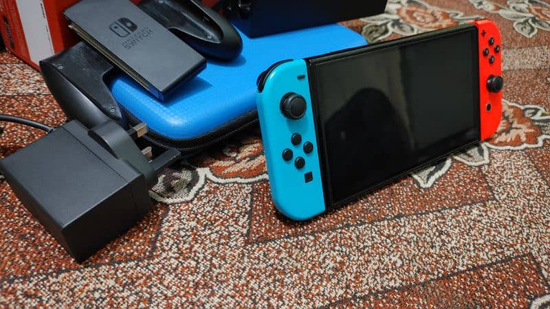 Nintendo switch oled jailbreak 128gb with boxe complte 13