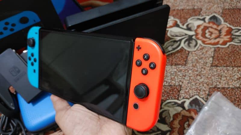 Nintendo switch oled jailbreak 128gb with boxe complte 16