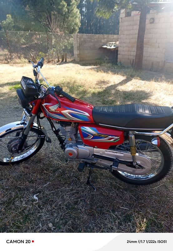 Honda 125  Abbottabad Number  and clean. No work. 1