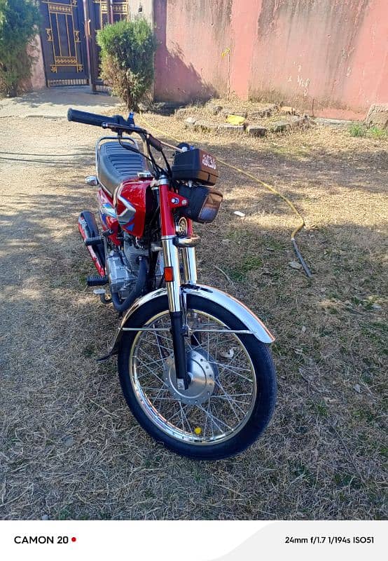 Honda 125  Abbottabad Number  and clean. No work. 4