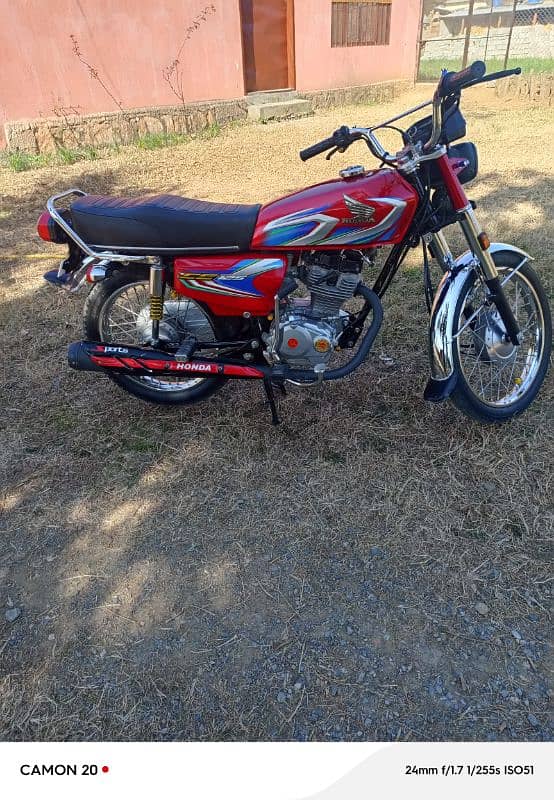 Honda 125  Abbottabad Number  and clean. No work. 6