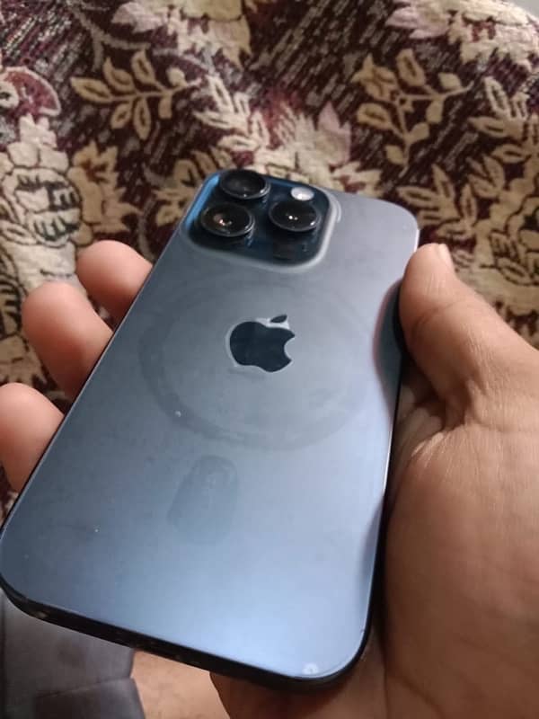 iphone 15 pro with original charger 0