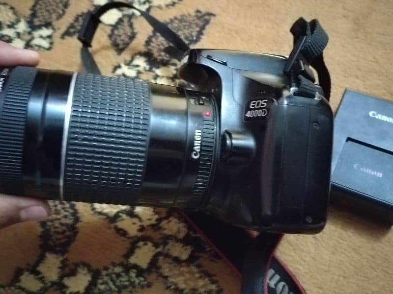 Nikon d3400 with sigma 70-300mm and canon 4000d with canon 75-300mm 12