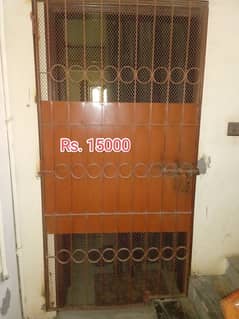 Urgent Sell Rust colour iron gate height 7ft and width 3.5ft