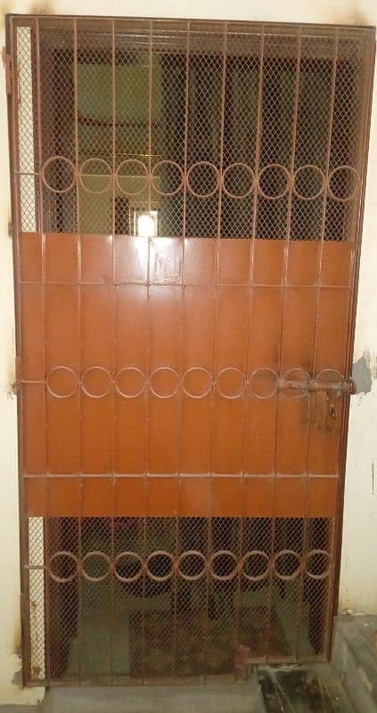 Urgent Sell Rust colour iron gate height 7ft and width 3.5ft 1