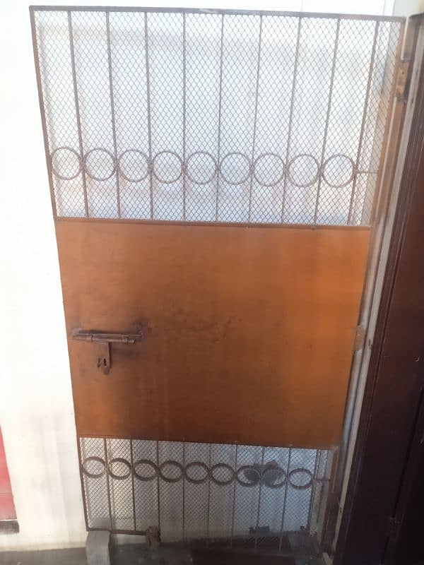 Urgent Sell Rust colour iron gate height 7ft and width 3.5ft 2