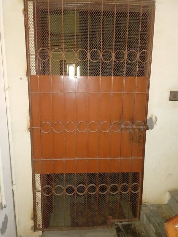 Urgent Sell Rust colour iron gate height 7ft and width 3.5ft 3