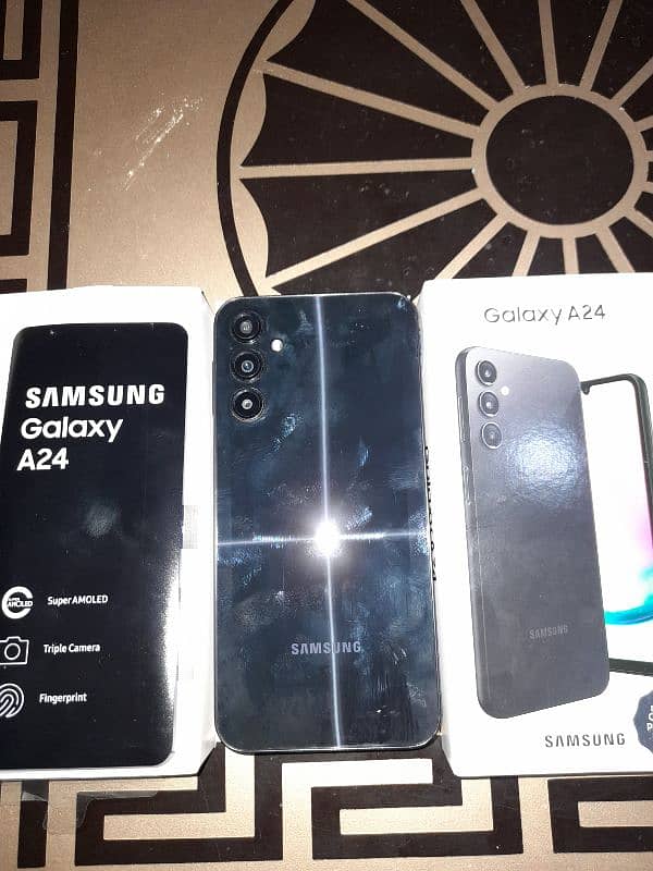 samsung a24 with box 8 128 10by10 1 hand use 2