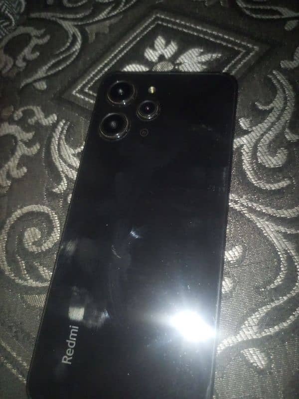 Redmi 12 in good condition 8/128 Sirf mobile hai Sath Kuch nahi 1