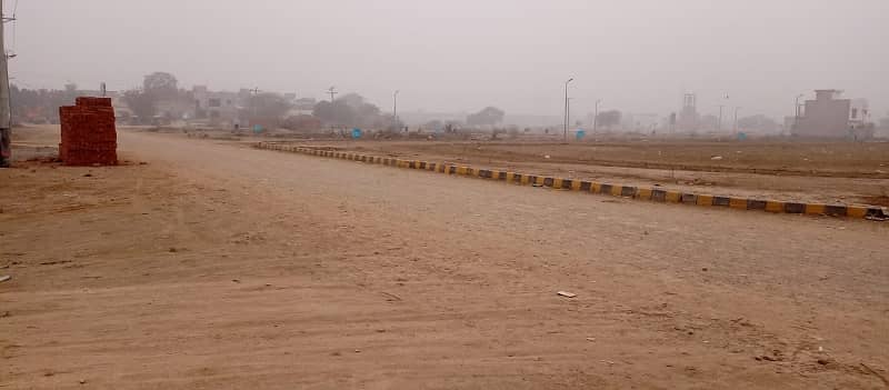 1 Kanal Residential Plot Super Hot Location 60 Feet Road Gated Area 24 Hours Security Near Wapda Main Gate And Pia Main Boulevard 1