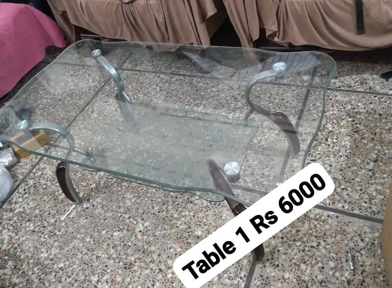 3 Centre Glass Tables and 1 study/ office table available 0