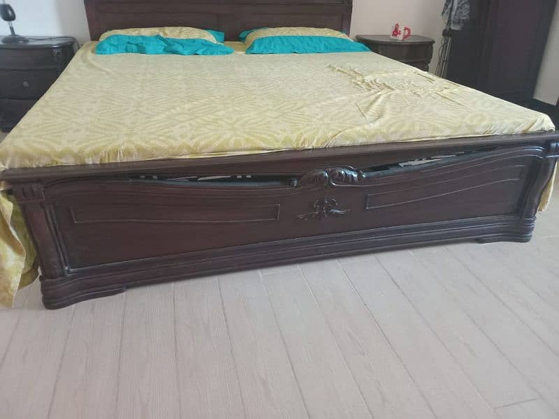 King size bed with side tables, mattress and dressing table. 4