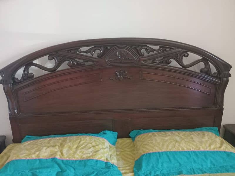 King size bed with side tables, mattress and dressing table. 6