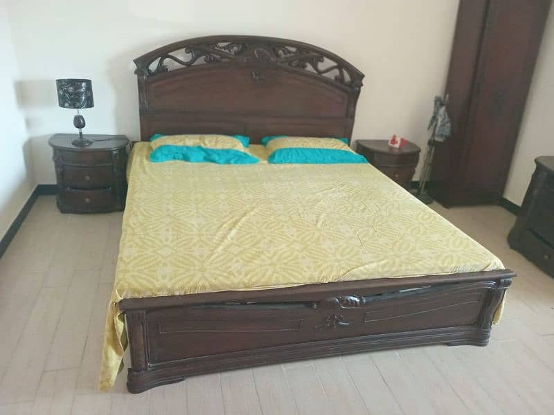 King size bed with side tables, mattress and dressing table. 9