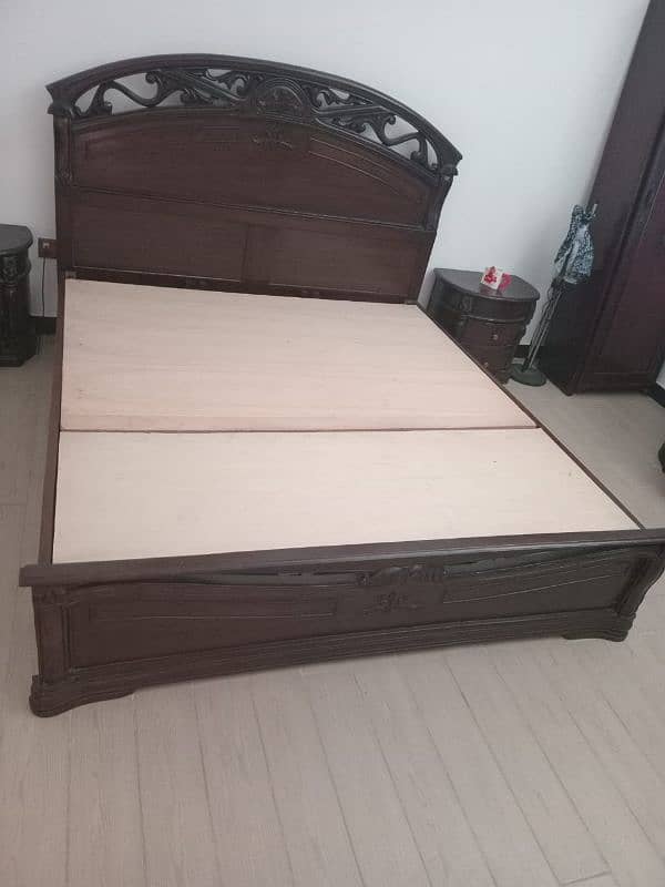 King size bed with side tables, mattress and dressing table. 10