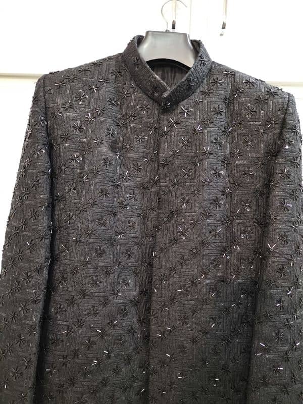 black color hand made sherwani and just 1 time use only 0