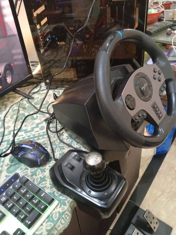 package gaming PC and steering wheel 15