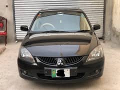 Mitsubishi Lancer 2004 / 5 totl genuine better than city,corolla,civic