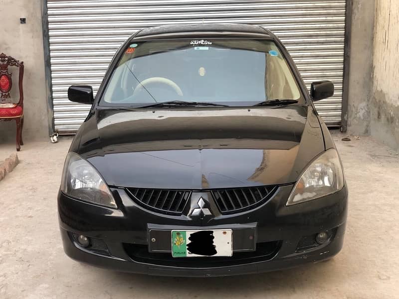 Mitsubishi Lancer 2004 / 5 totl genuine better than city,corolla,civic 0