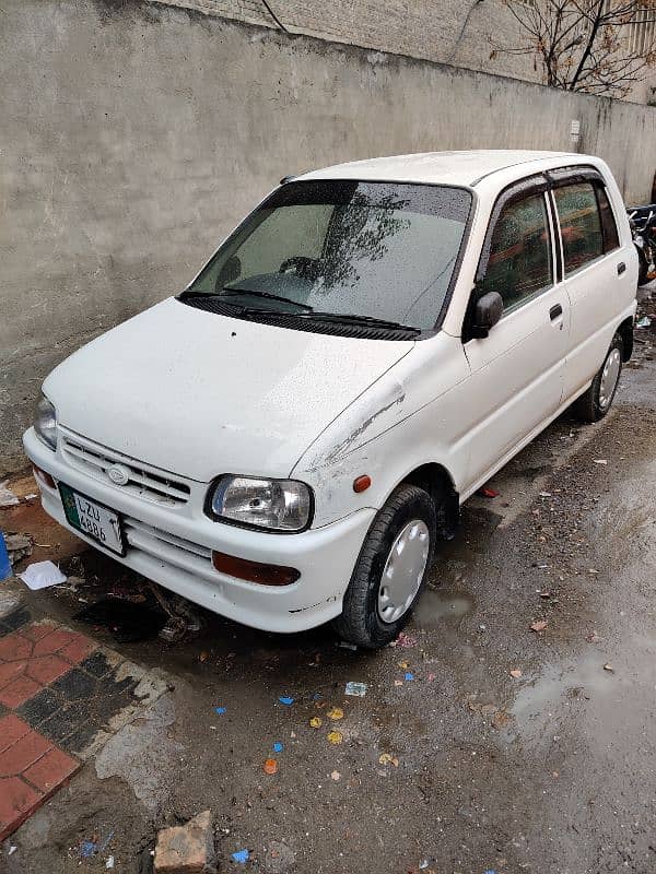 Daihatsu Cuore 2005 total Geniune 0/3/2/7/5/2/8/1/7/5/4 1